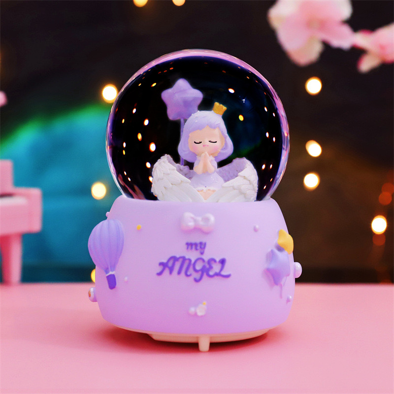 创意2025新年款爆款水晶球八音盒星星大羽翼女孩音乐盒节日礼物