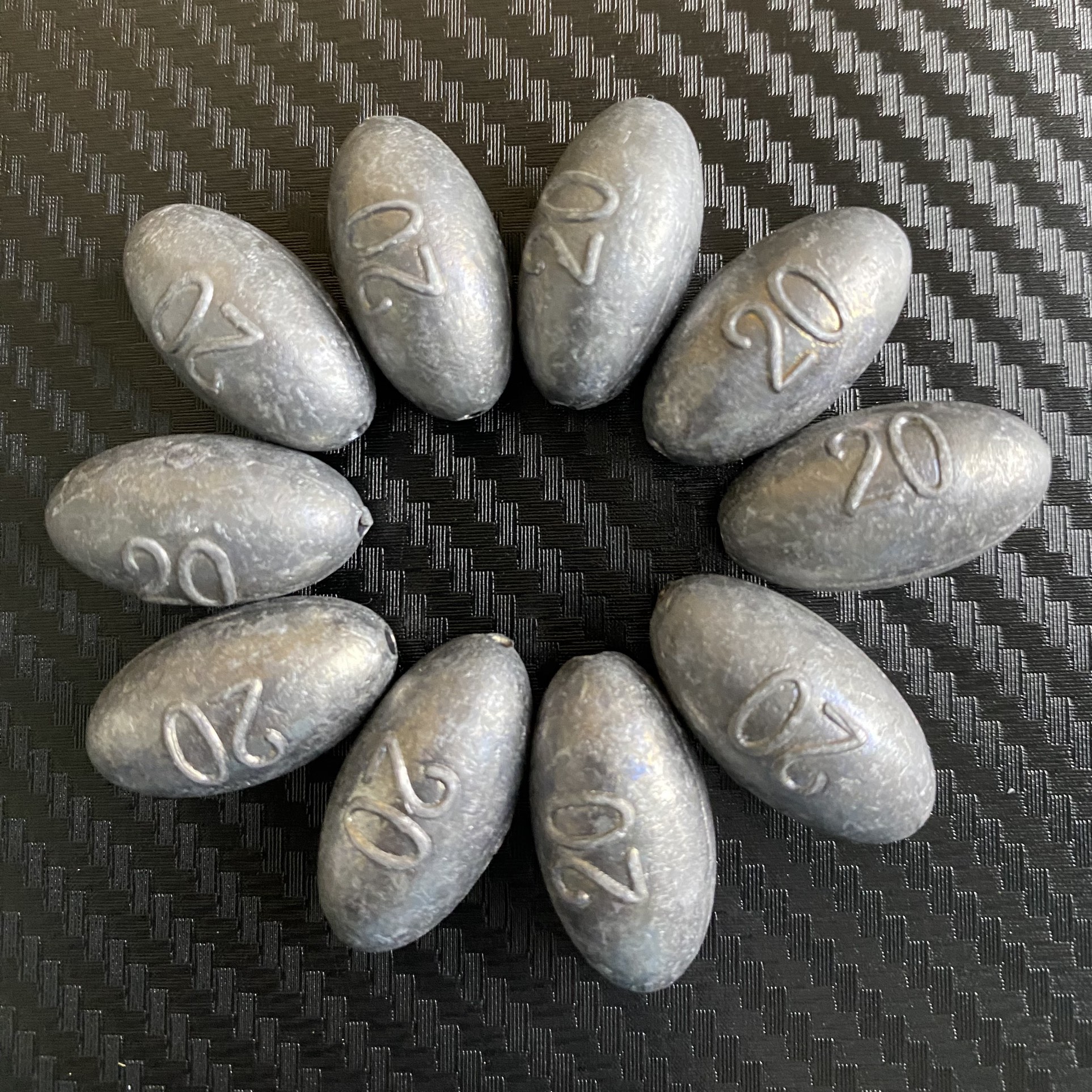  包邮小瑜橄榄型铅坠中通坠海竿通芯铅坠抛竿鱼坠铅坨串钩足重钓