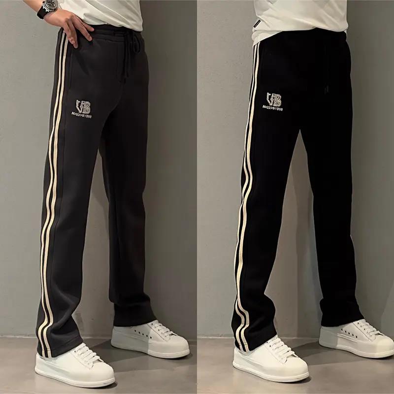 冬季新款欧货男士阔腿休闲裤时尚潮流宽松直筒裤高街织带百搭裤子