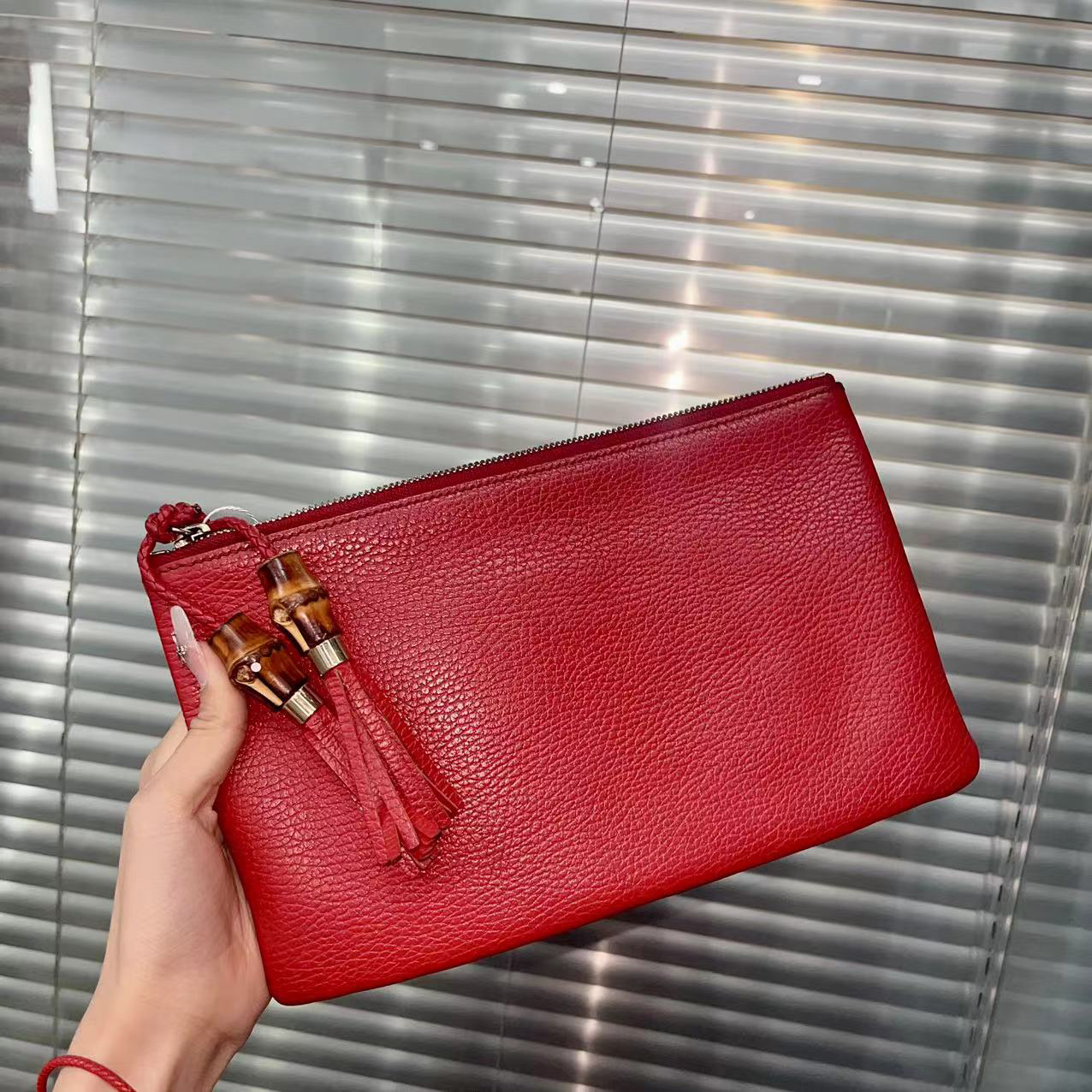 95新 GUCCI/古驰 兔兔奢美伊/古驰手拿包/95新/1399