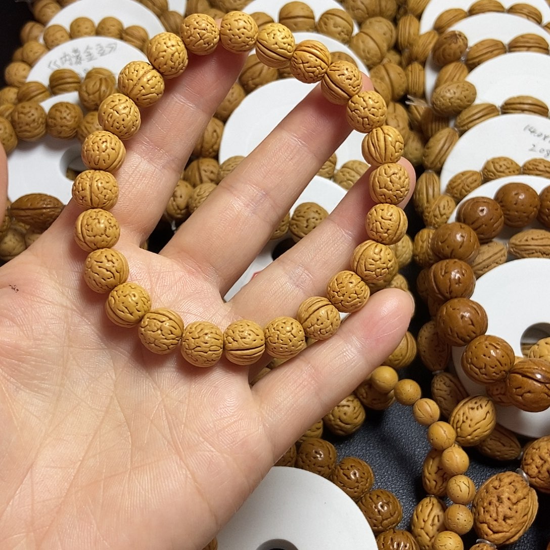 女***妞手串桃核金豆桃核一物一图