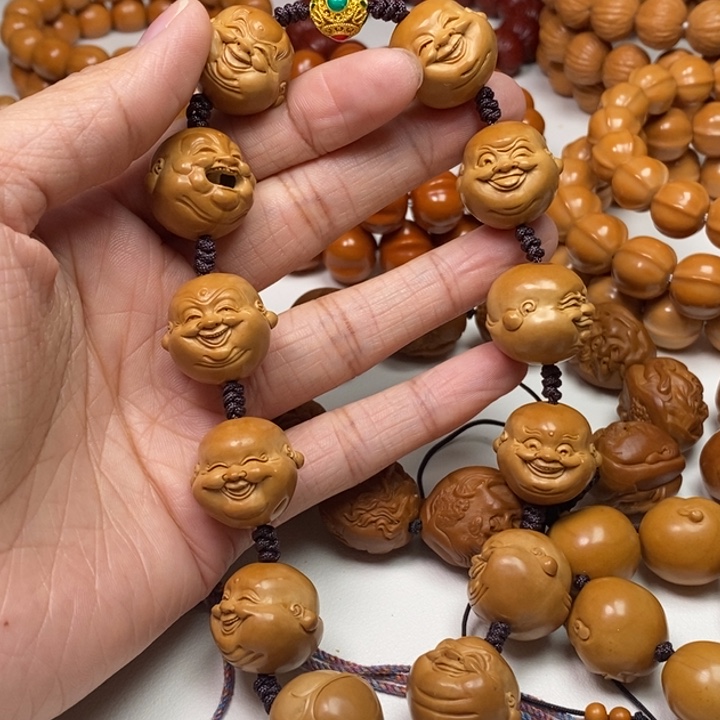 橄榄核吊坠河****司人生百态