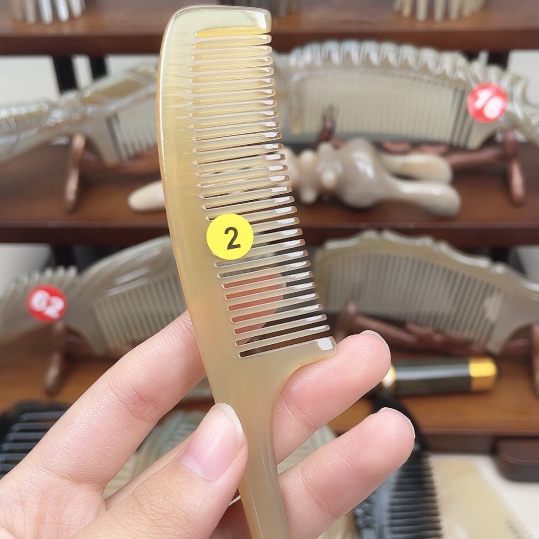 纯手工制作的牛角梳2山***网