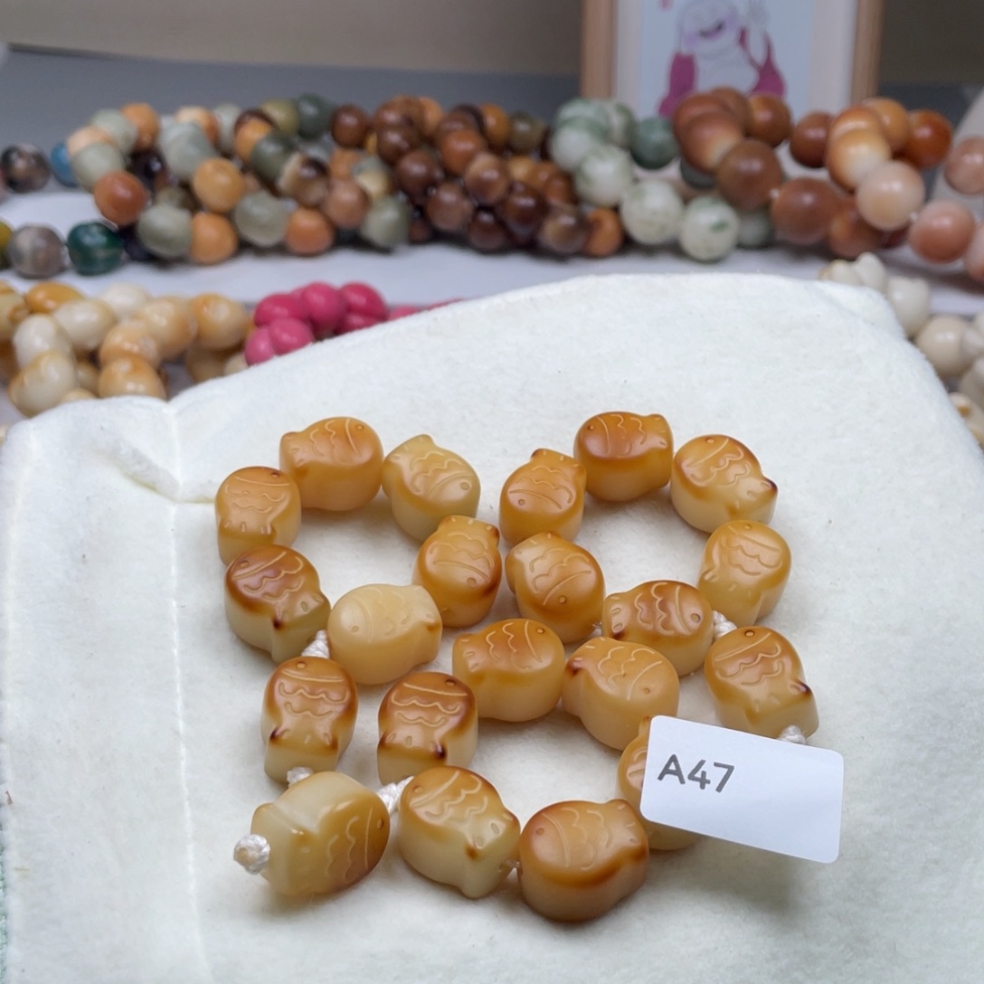 吊坠菩提根/象牙果A47鱼饼16mm一串通货随机