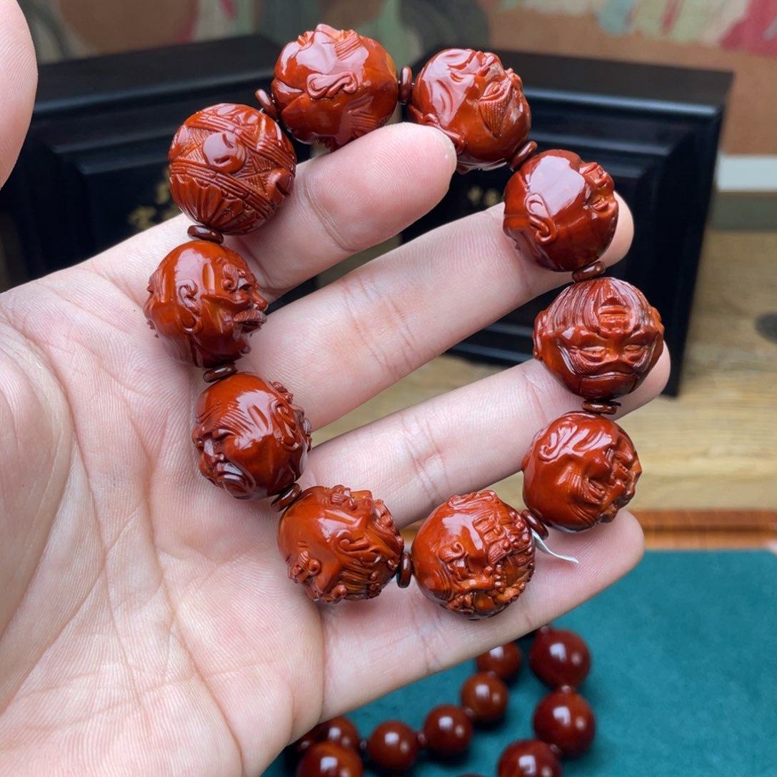 橄榄核手串T****o双面十八罗汉表弟回血