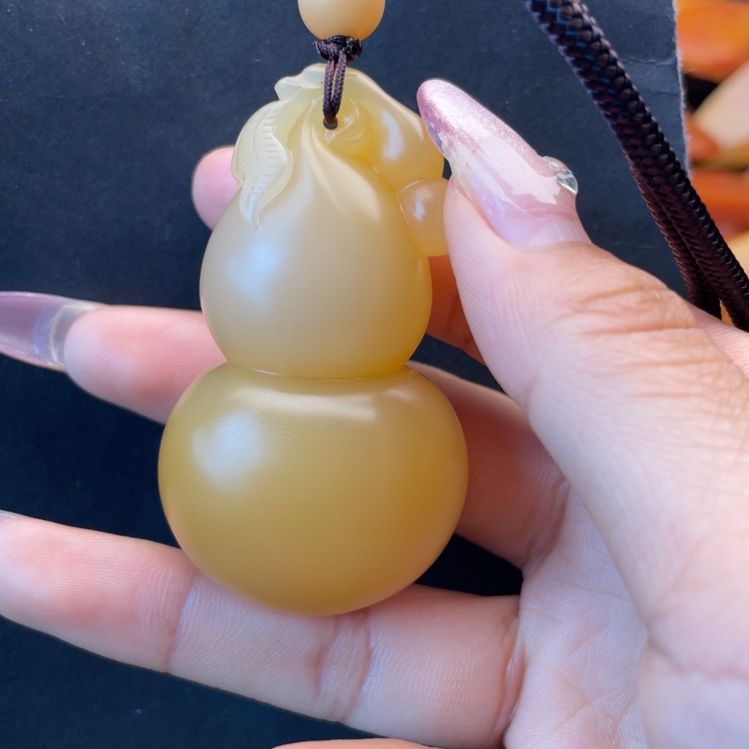 石英质玉黄蜡石手把件未镶嵌小*带