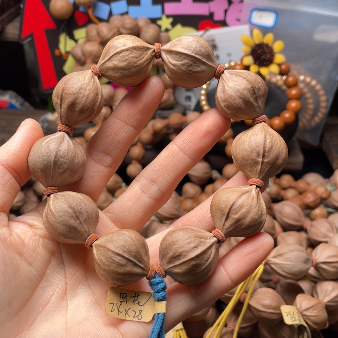 喆***橄榄核吊坠四花铁核