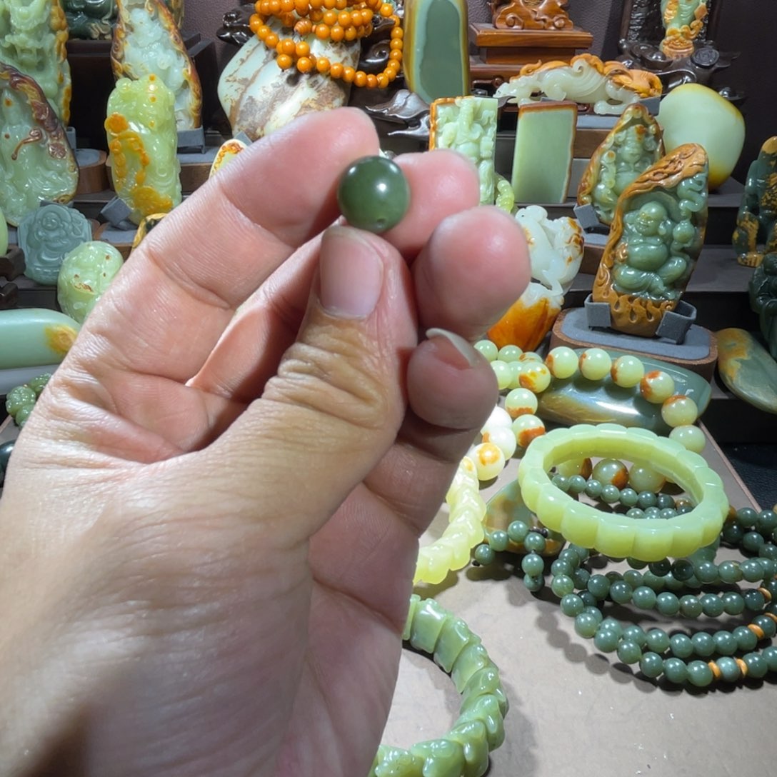 透闪石质玉单珠未镶嵌孤***象