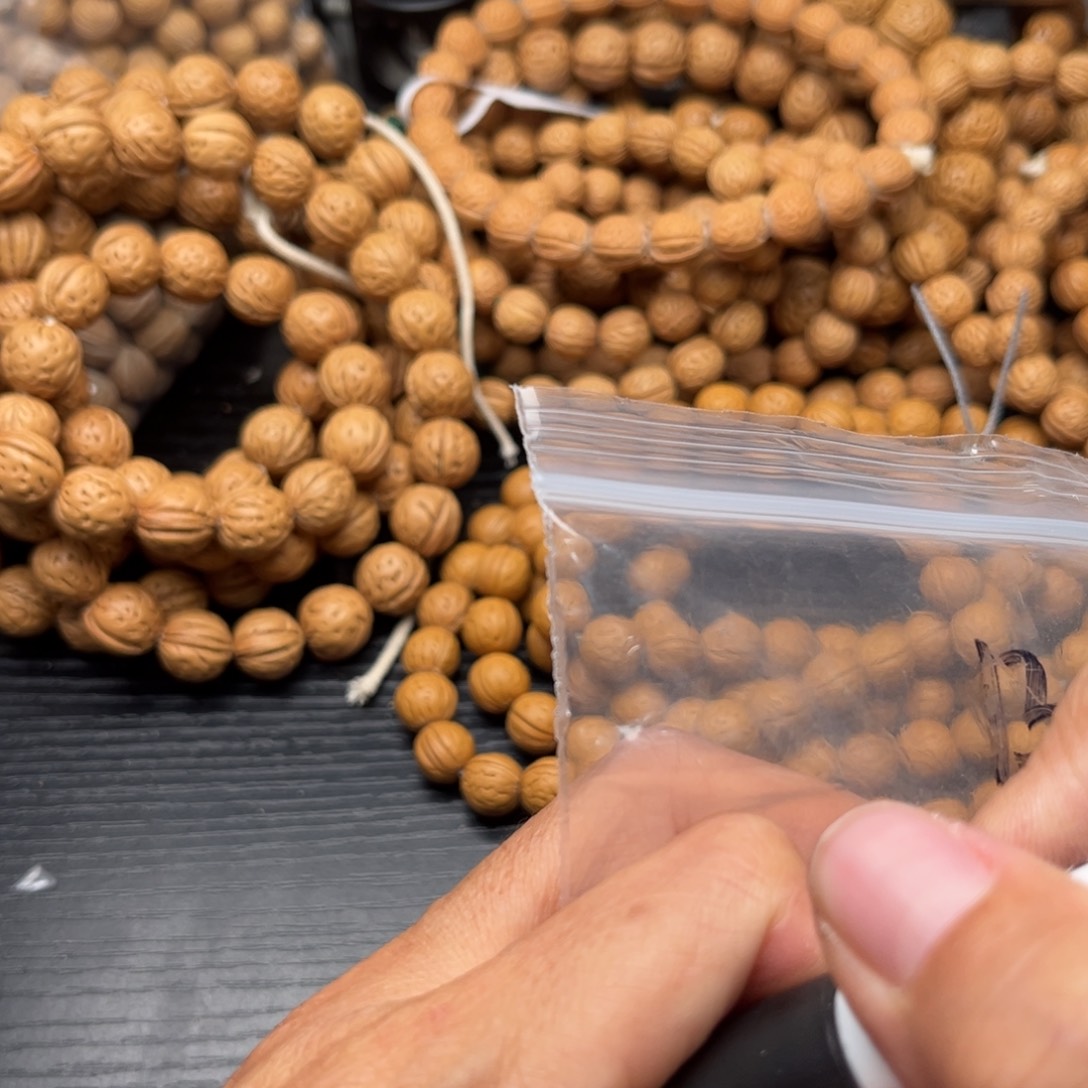 胖***哥文玩核桃手串小桃核散籽批发