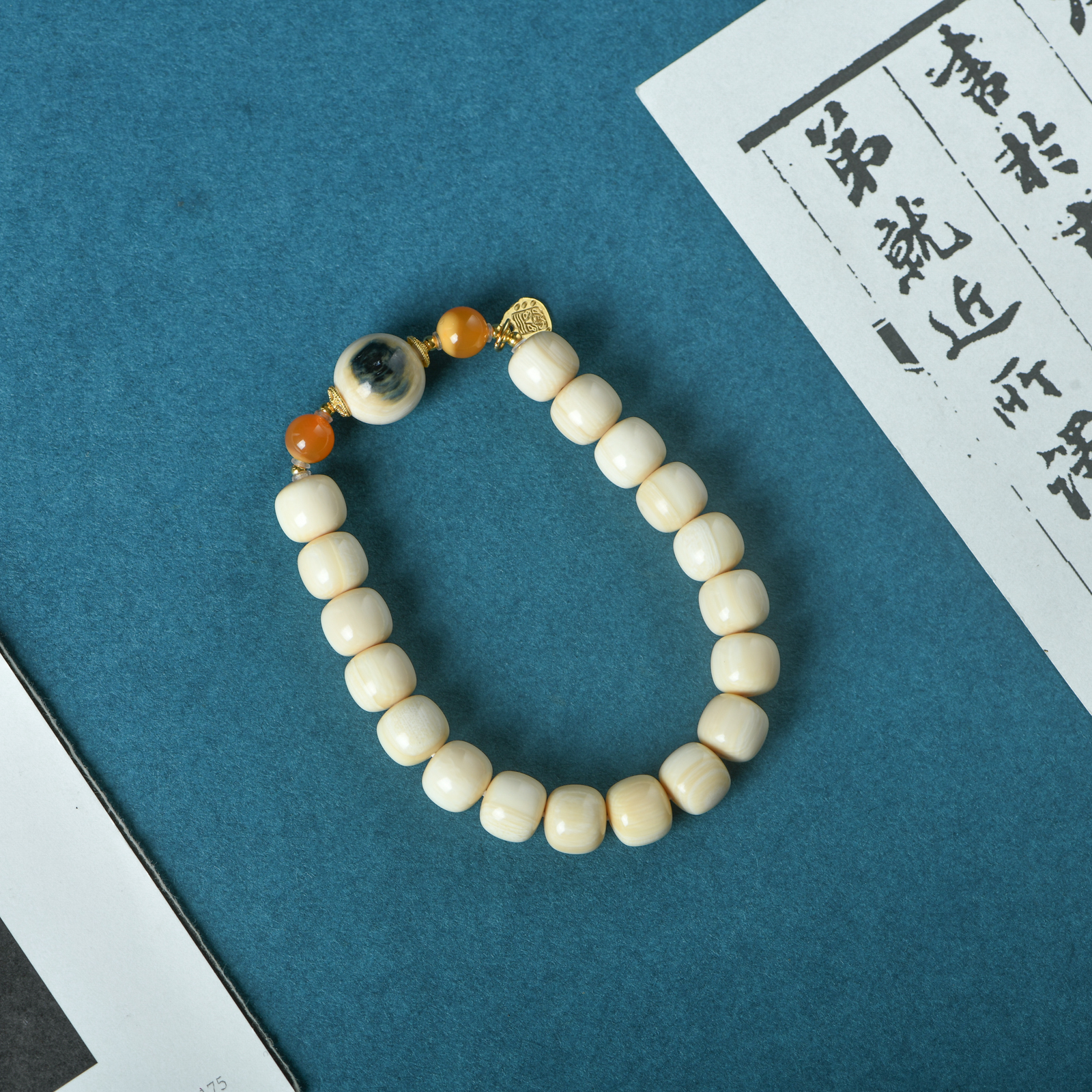 猛犸牙精工8x9老型珠手串蓝眼睛单珠款