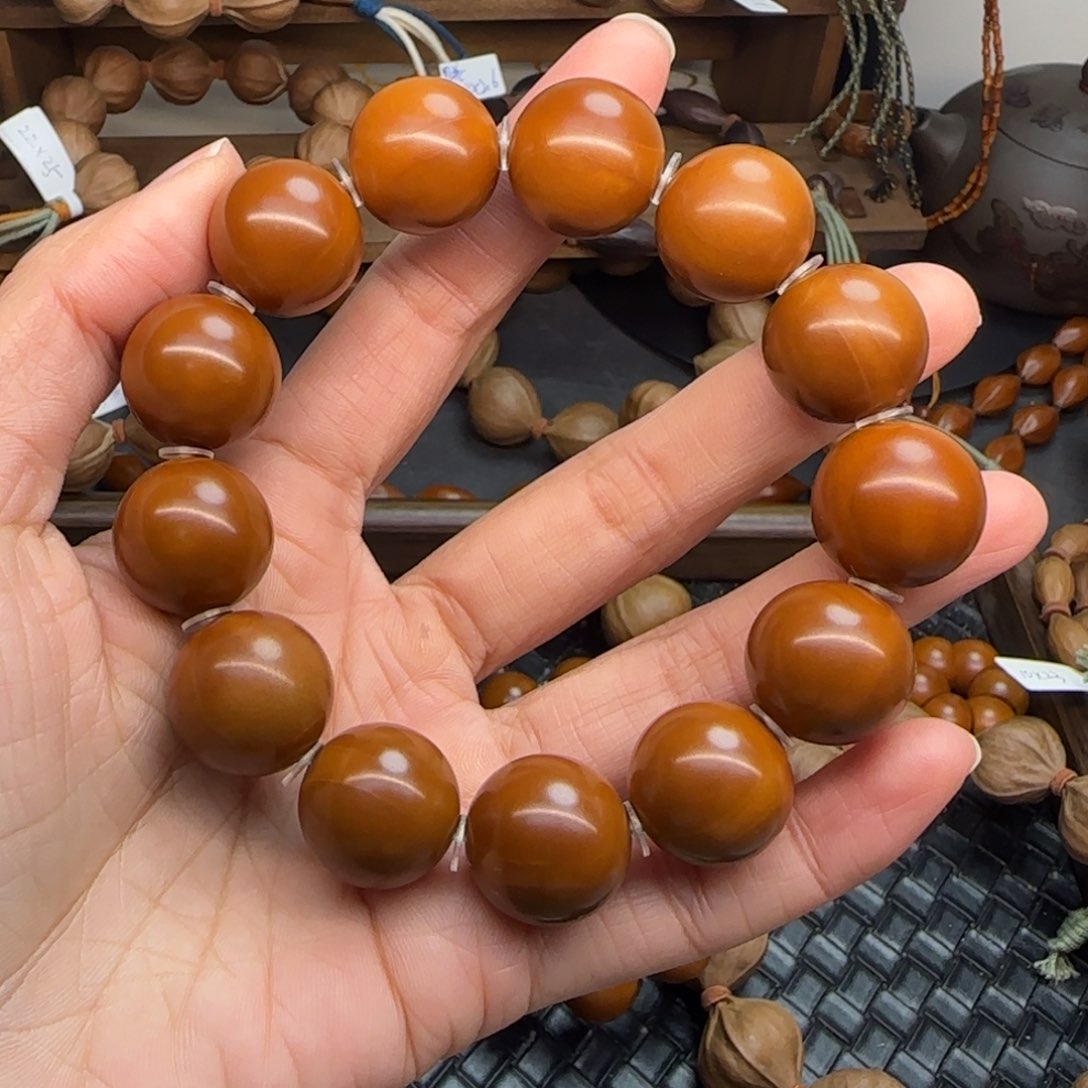 手串橄榄核01。1.8精品正圆光珠