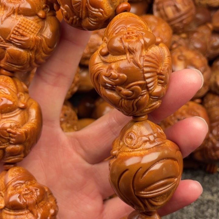 橄榄核吊坠辉**.橄榄