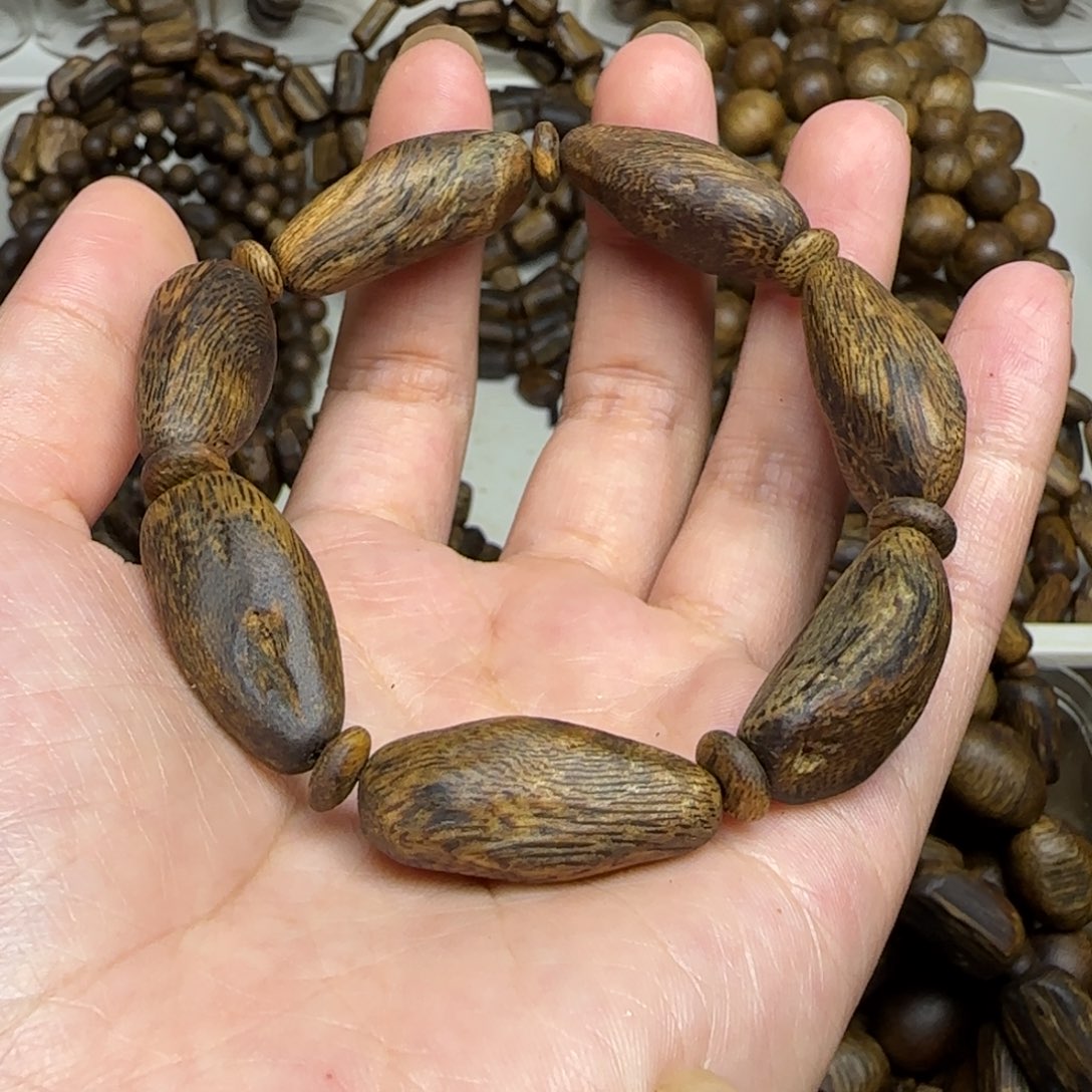 春***泥手串沉香单圈树丁包头老料12.8克乌身