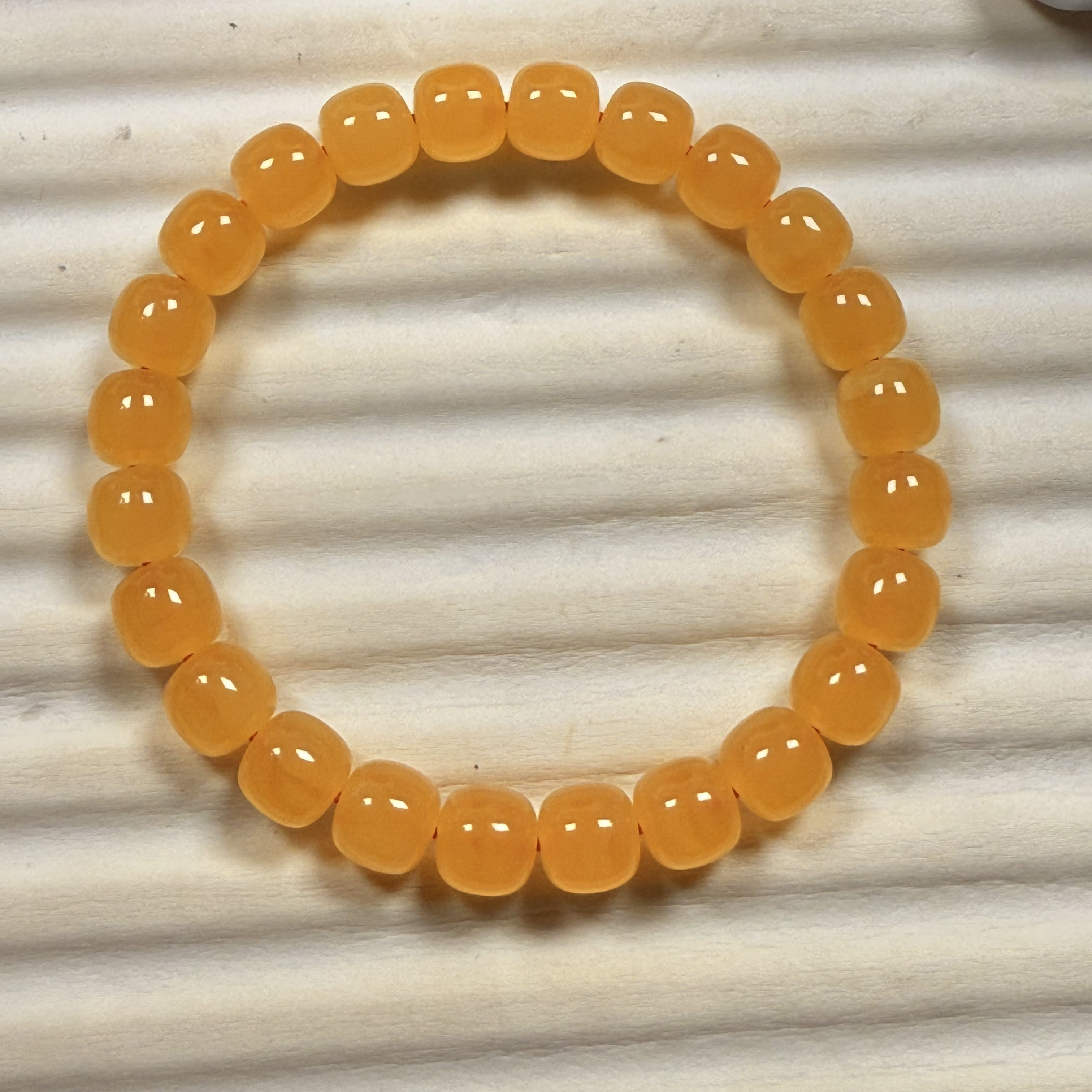 9×8焦皮橘红蜜蜡同料手串