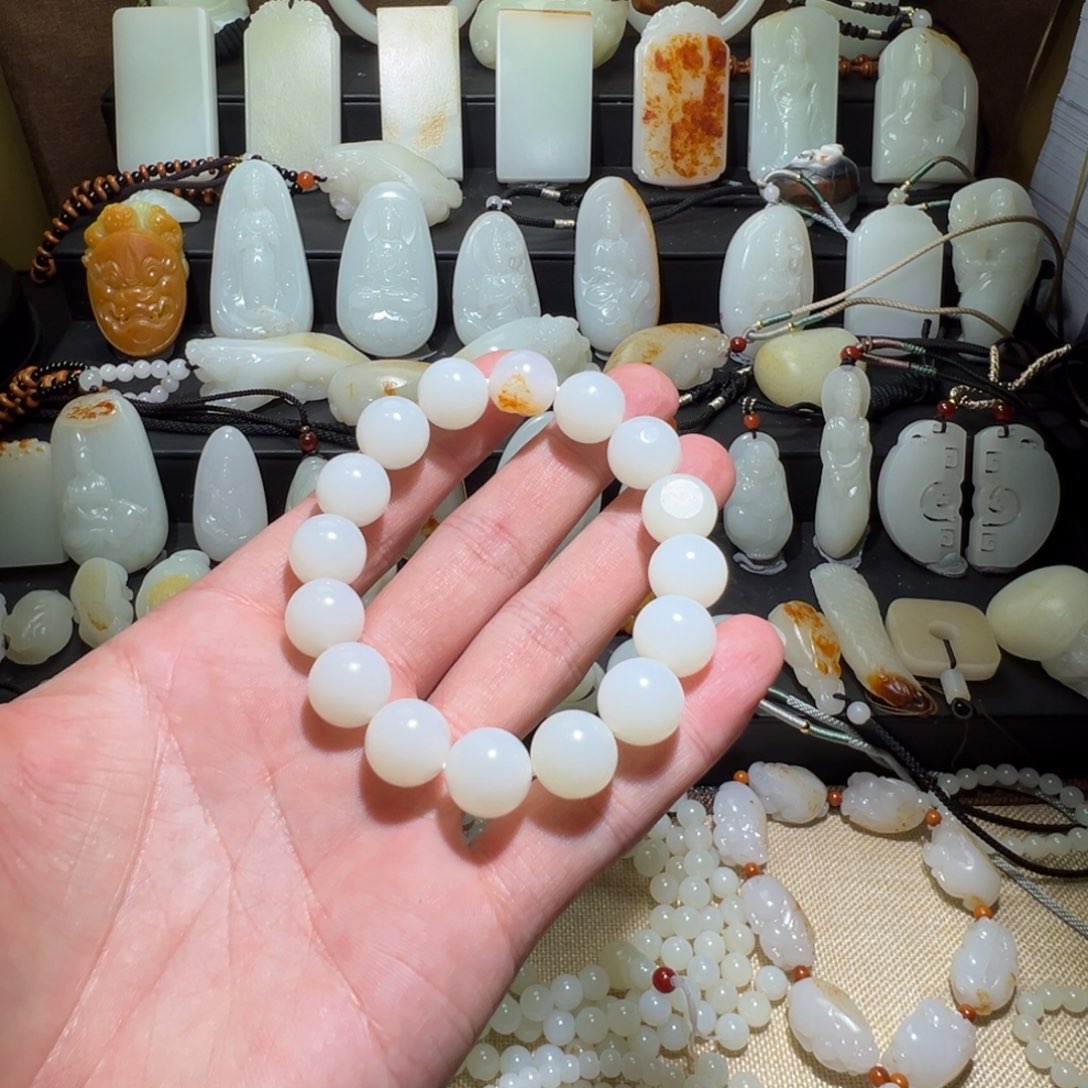 和田玉手串未镶嵌E***?