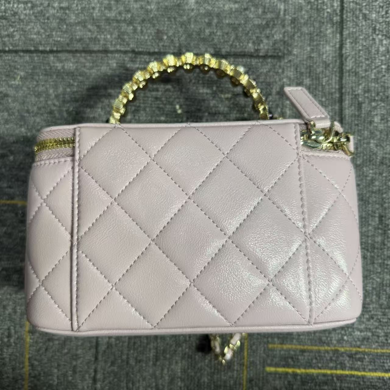 2025新款真皮女包珍珠手柄粉色