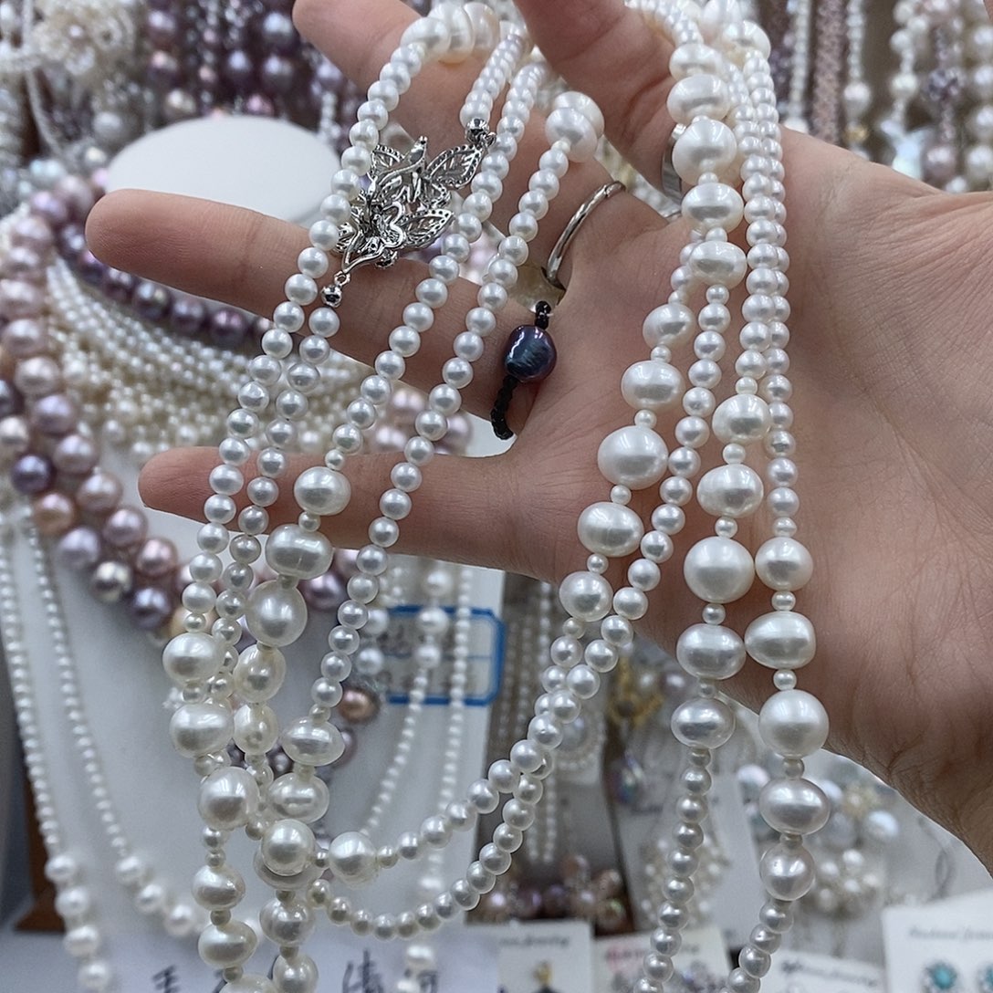 夏***央耳饰银S925镶嵌淡水珍珠