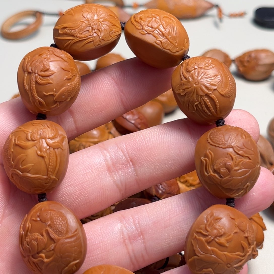 橄榄核吊坠M**.荷花鱼