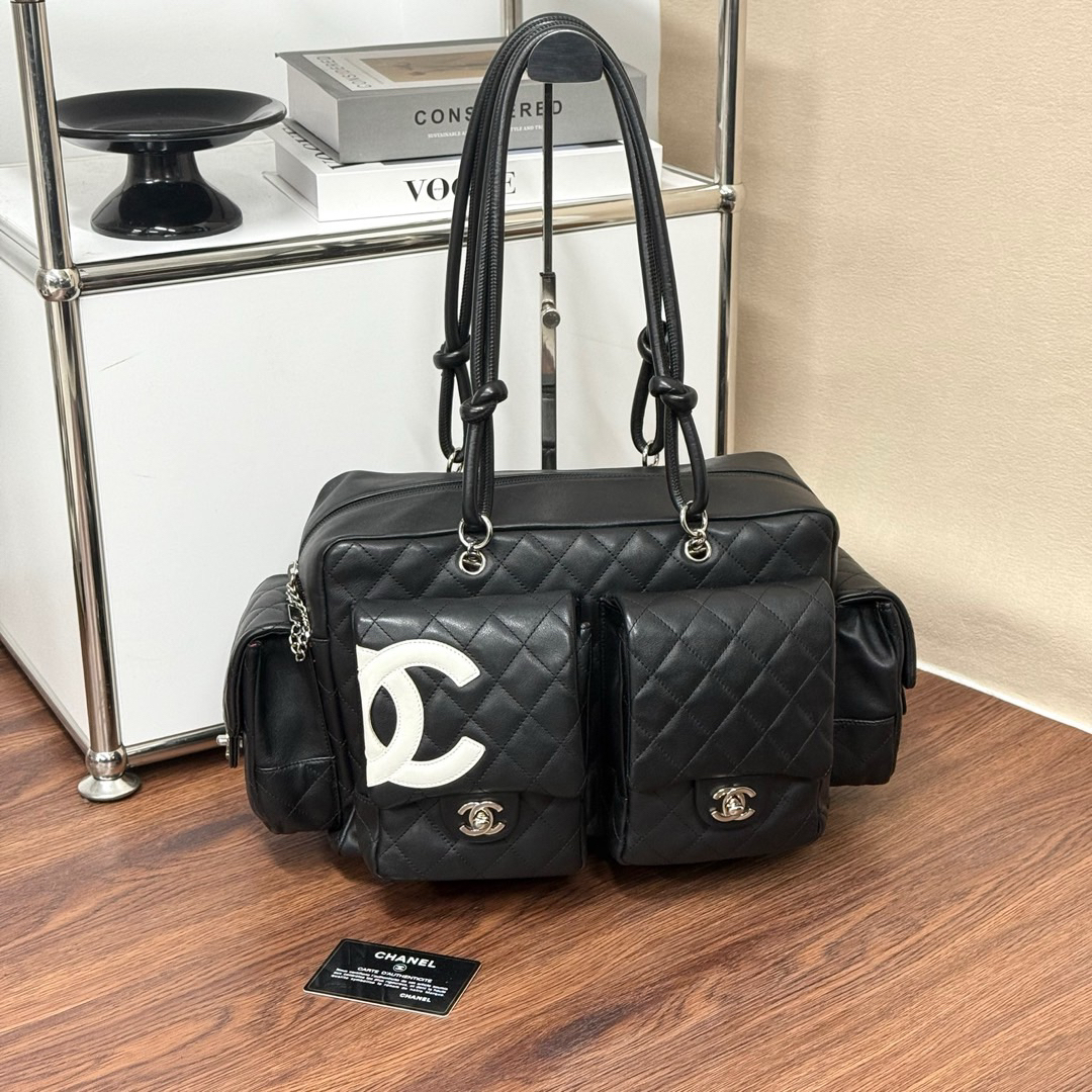 95新 Chanel/香奈儿 黑白 银扣 牛皮 康鹏机车包大号/691403496