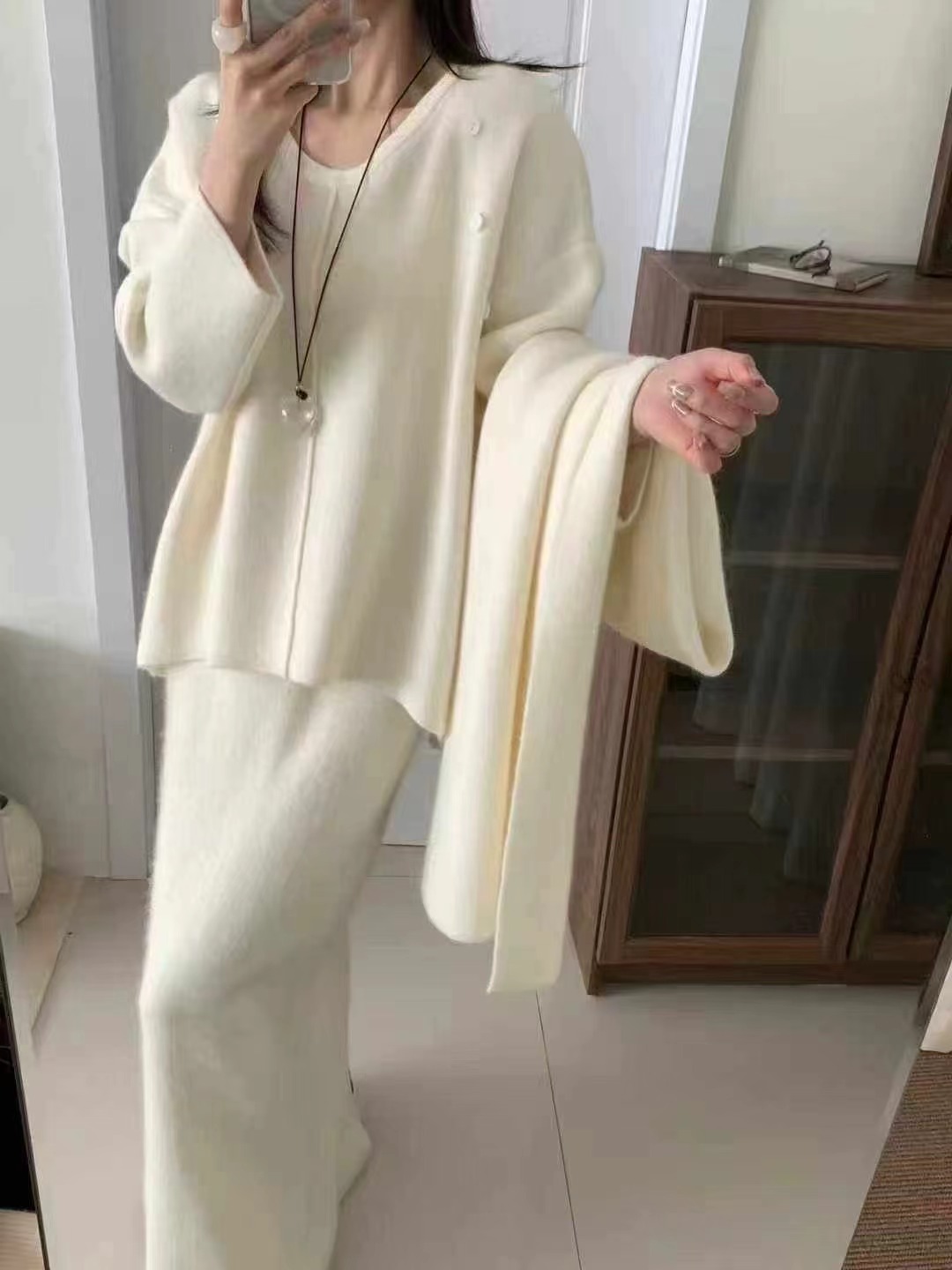 冬季新款时尚休闲浣熊慵懒风带围巾针织套头百搭气质毛衣