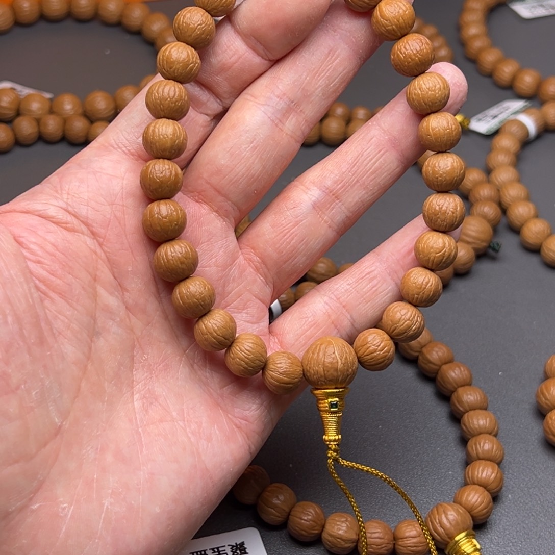 M***」吊坠猴头核桃凤羽911