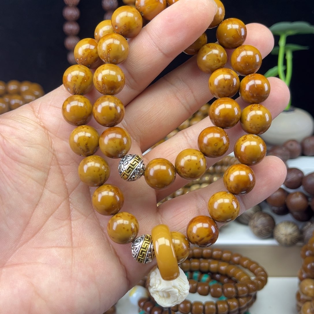 紫金鼠手串贺****?紫金鼠光珠手持13