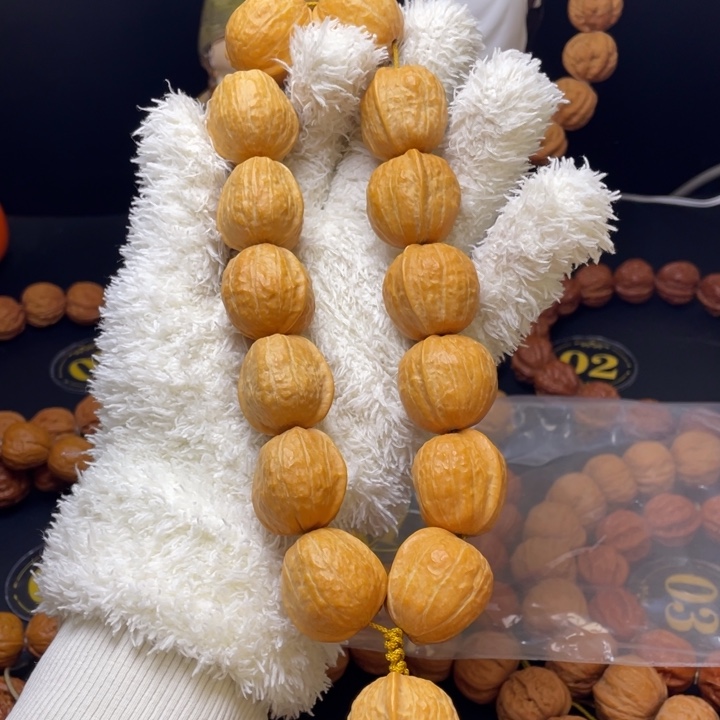 爱***觉手串文玩核桃木鱼