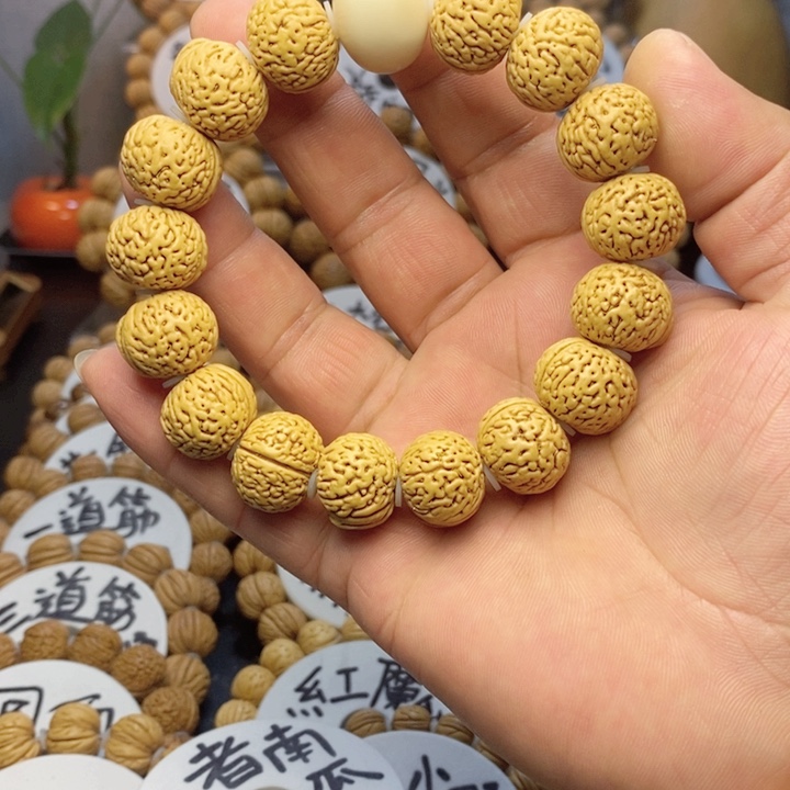 【闪购商品】开****孩桃核雕刻手串手链