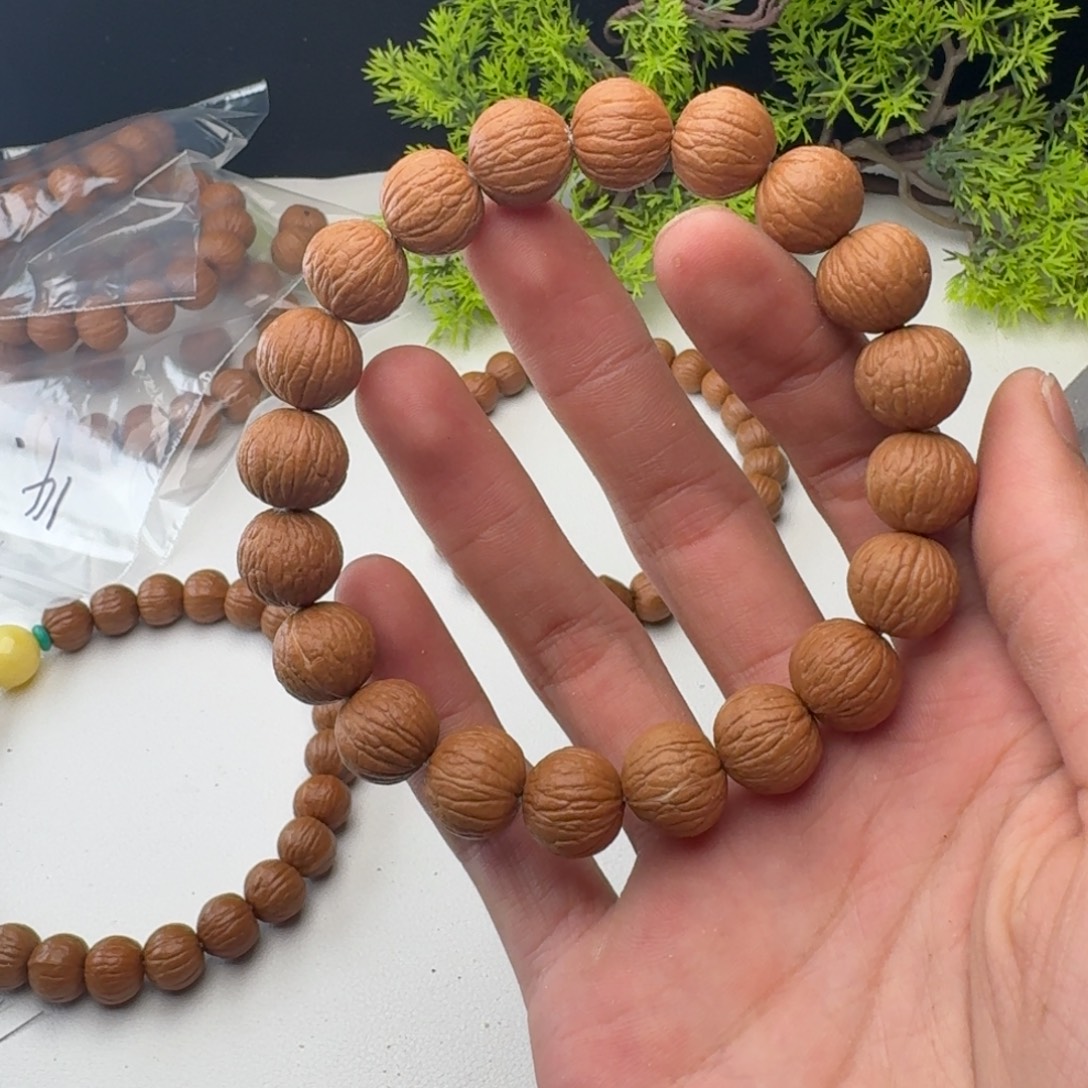 泽***.猴头核桃手串14同风雨