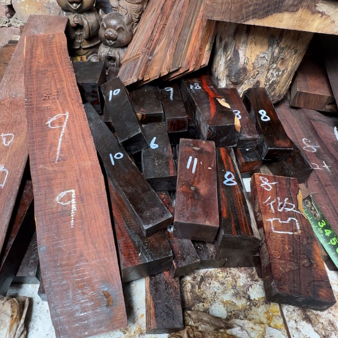 心***宽木大红酸枝手把件的