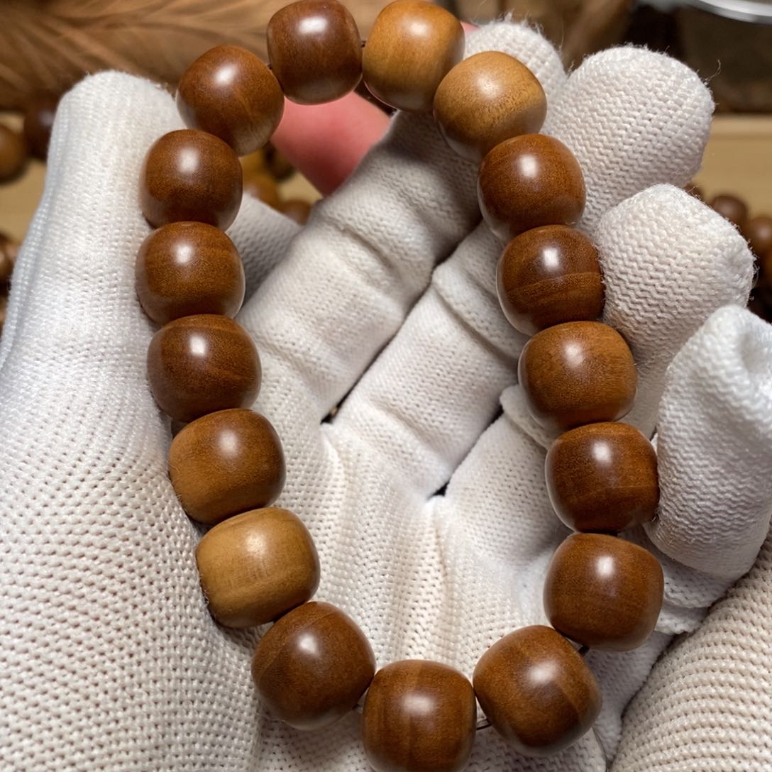 檀香木其他13*14 珠形 瑕疵款