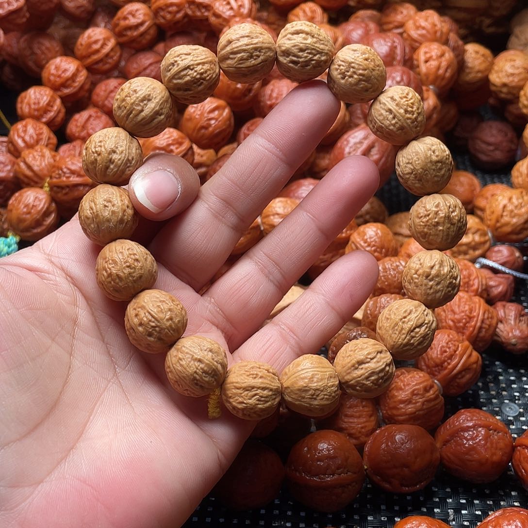 黎***明文玩核桃手串金豆子