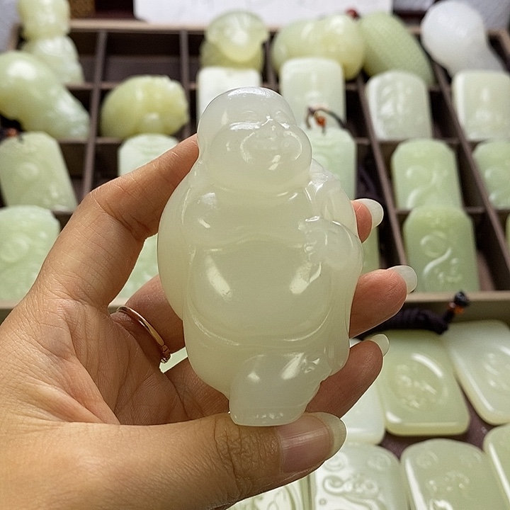 昆仑石渭**客佛手把件丽