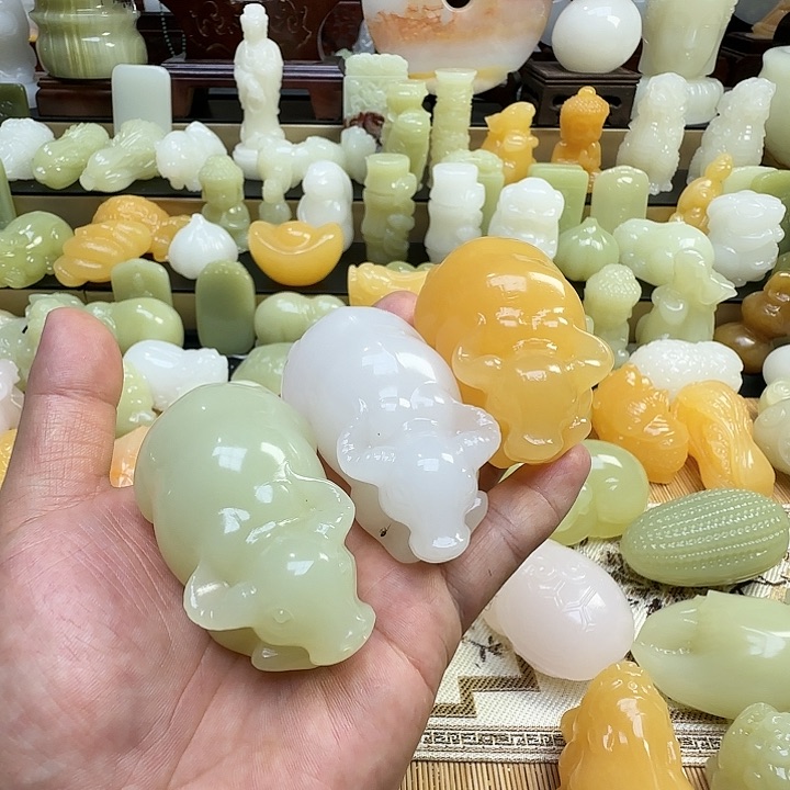 石材好好的手把件三个牛