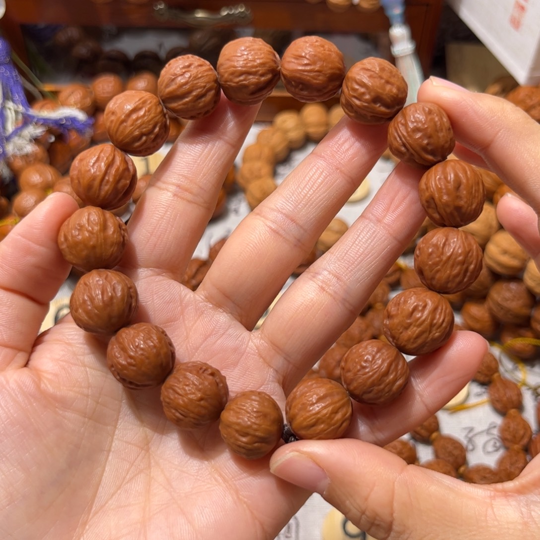 南***戟桃核吊坠红皮纽扣