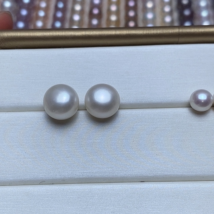 飘***雪银S925镶嵌淡水珍珠耳饰