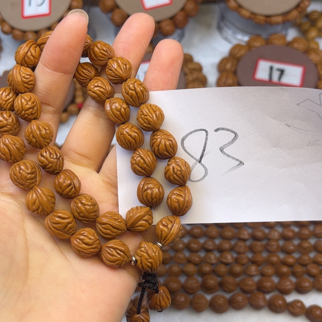 核桃龙纹桃核手持肚卡11小金豆