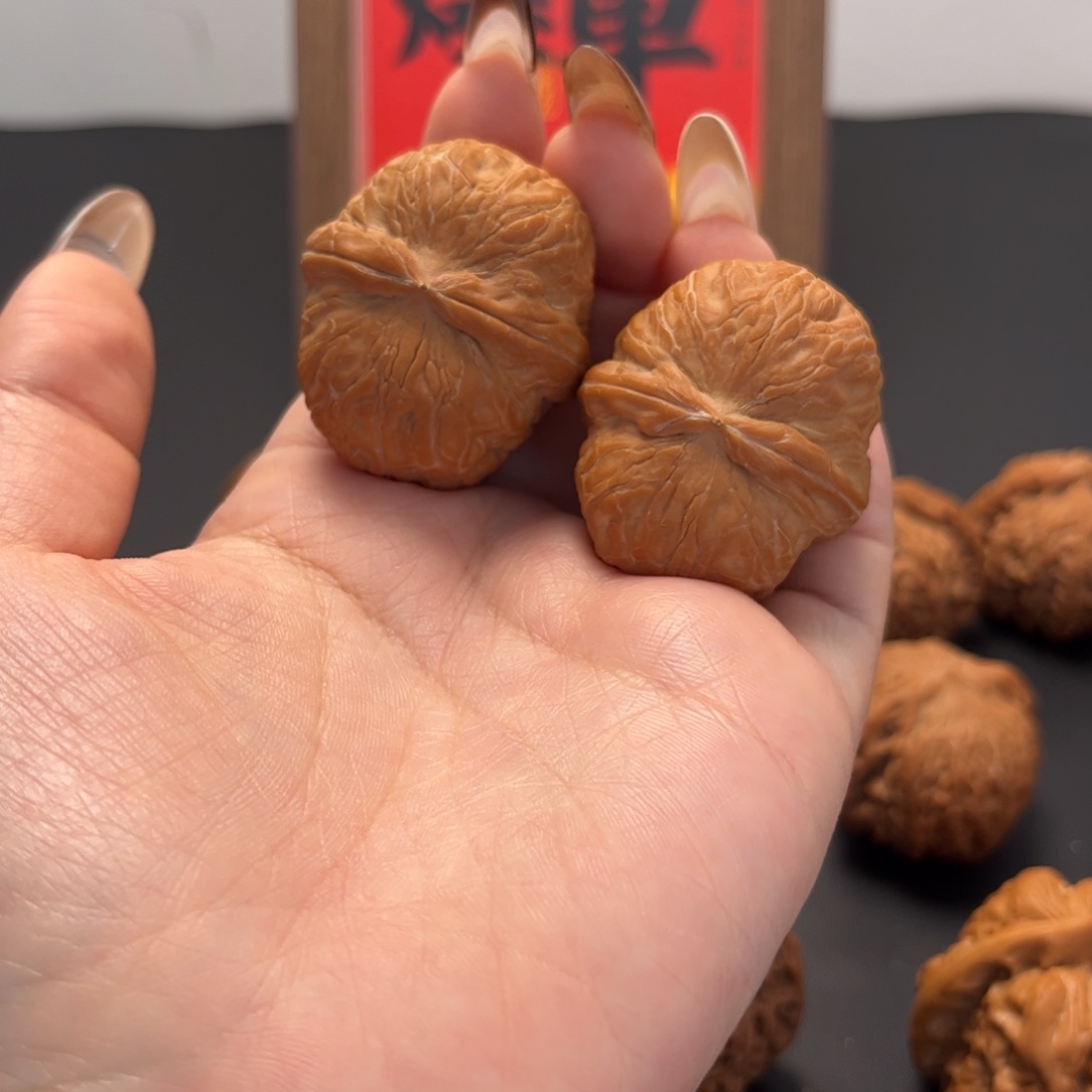 黄***马文玩核桃把件元宝40