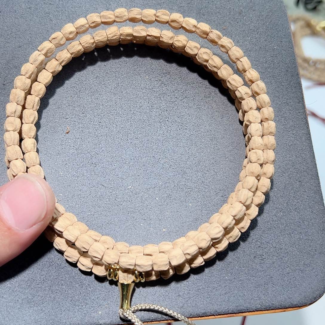 柏香籽/百香籽吊坠陌**n