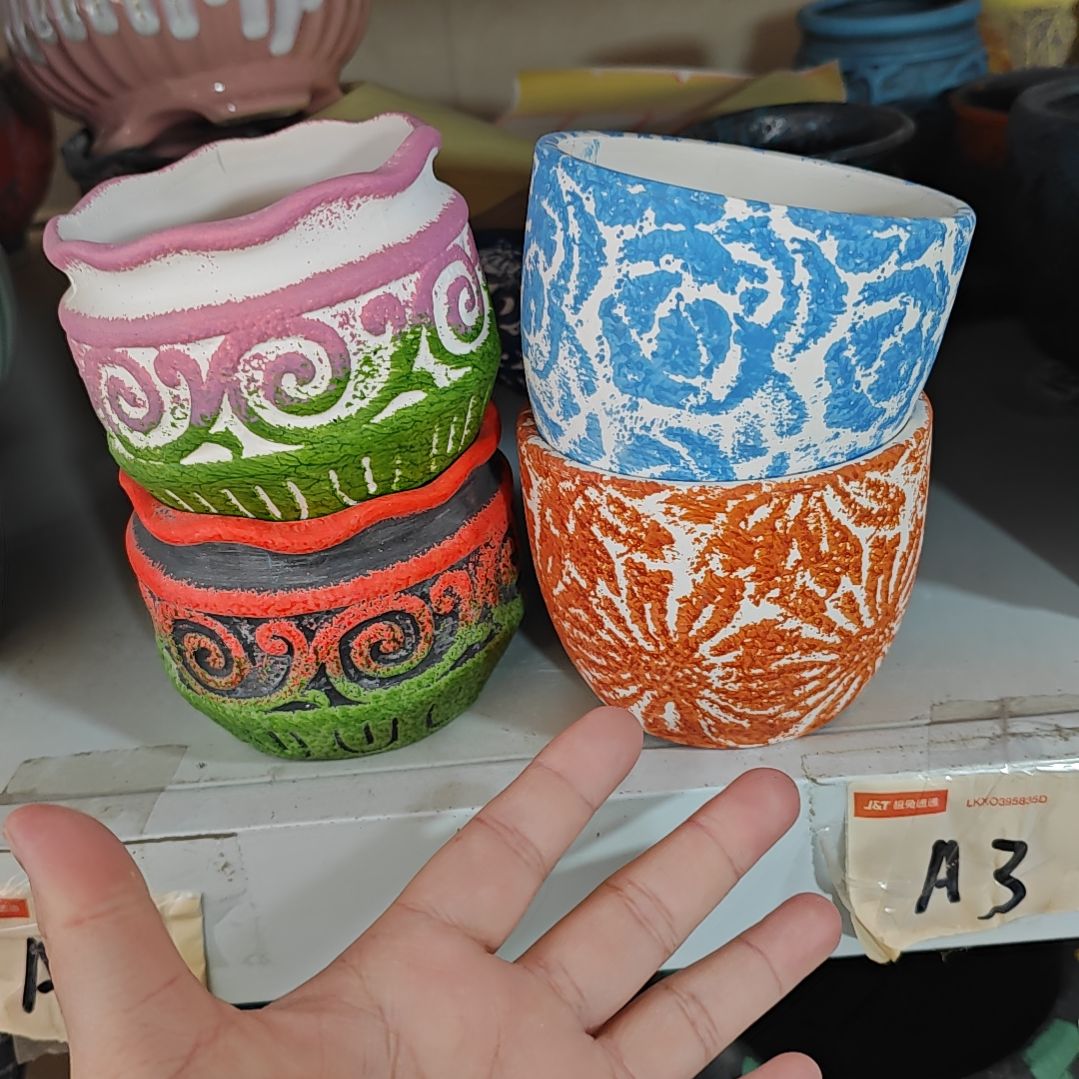 红陶吸水透气的白陶花盆