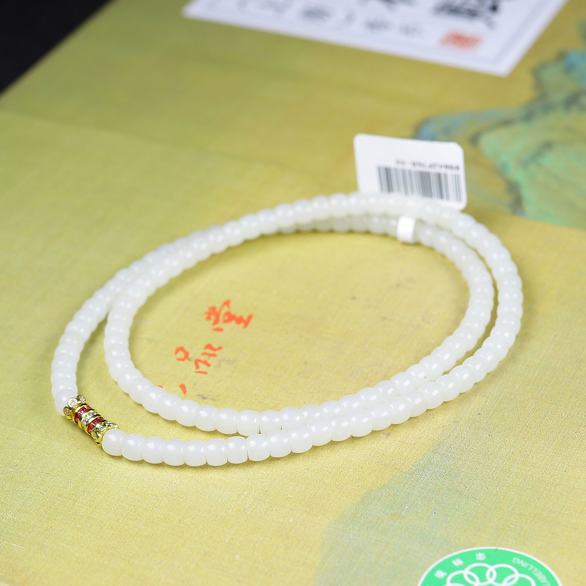 111217和田玉米达料直切珠项链