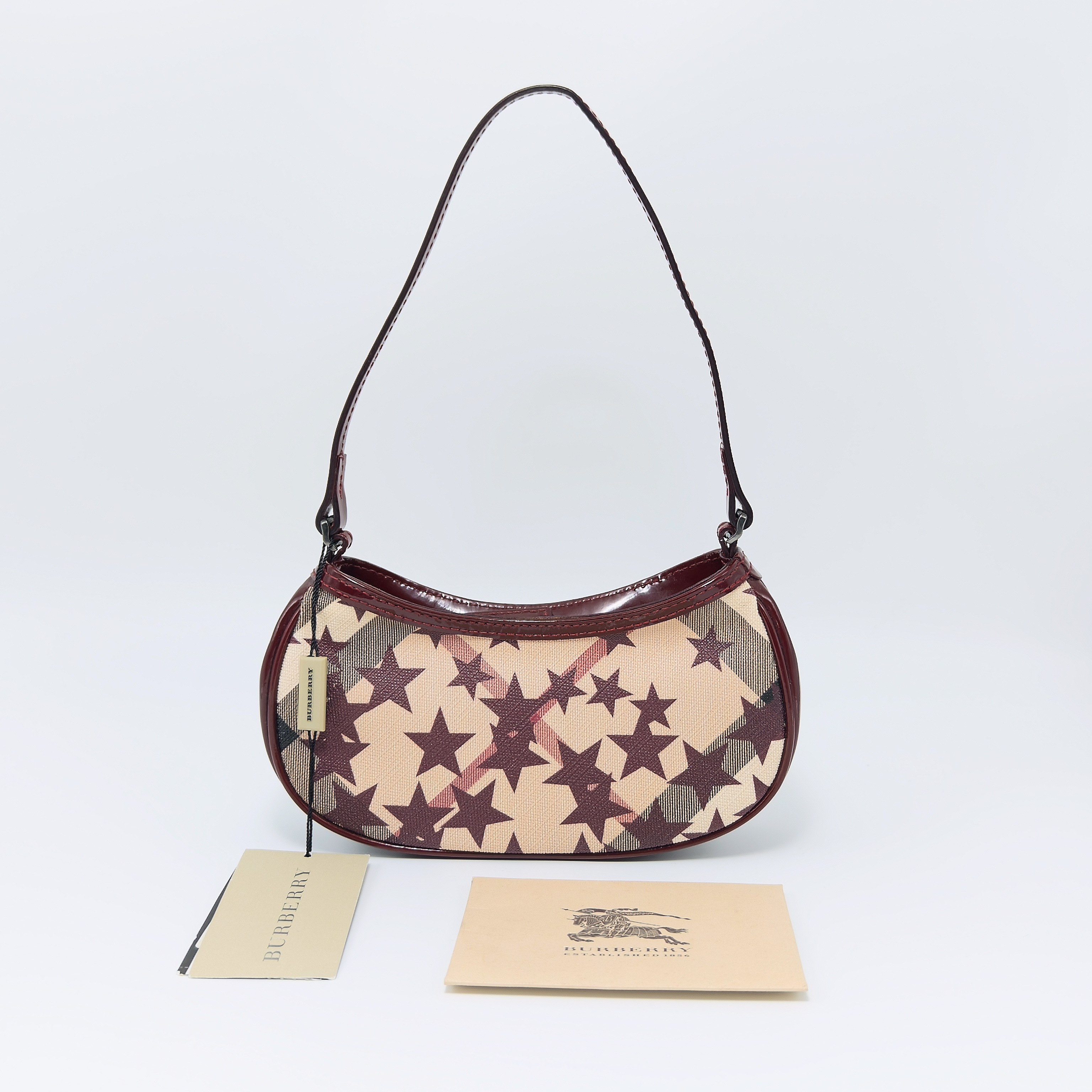 99新 BURBERRY/博柏利 中古星星腋下包 83421