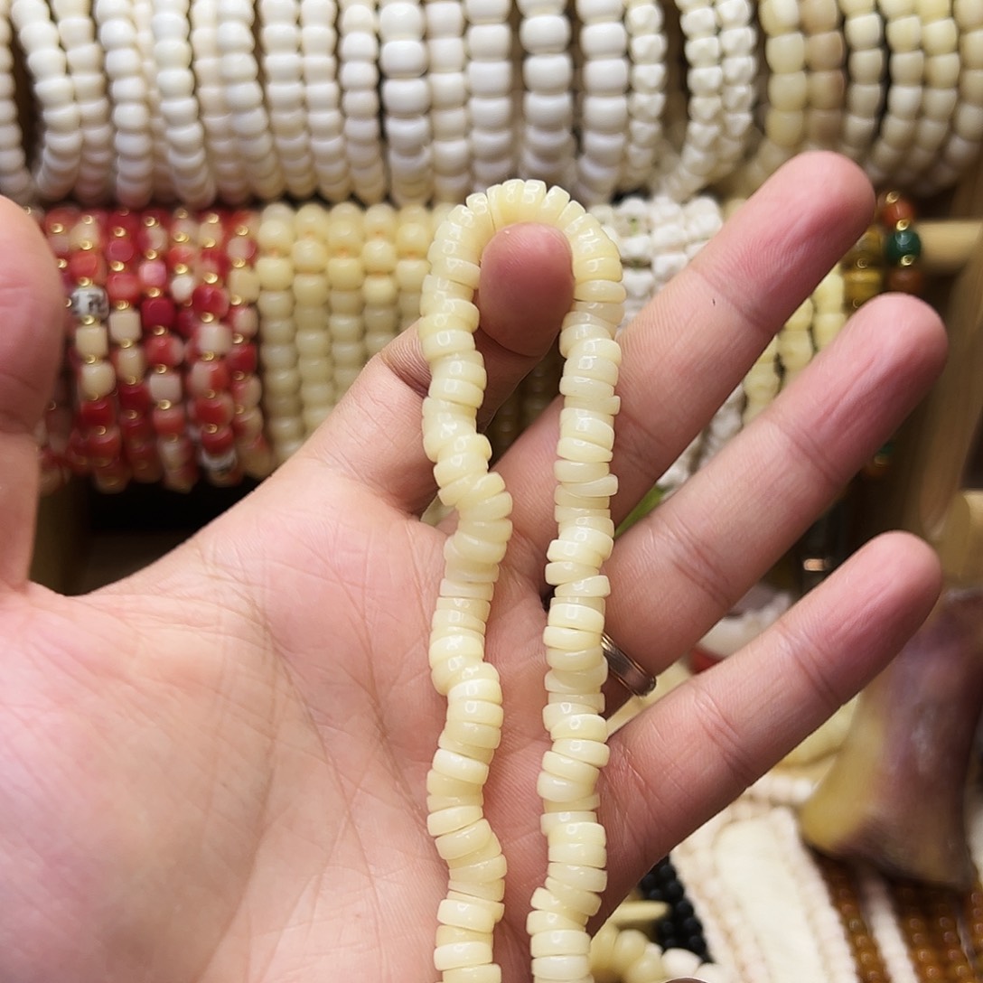 陈***峰把件桃核驼骨大肠手持