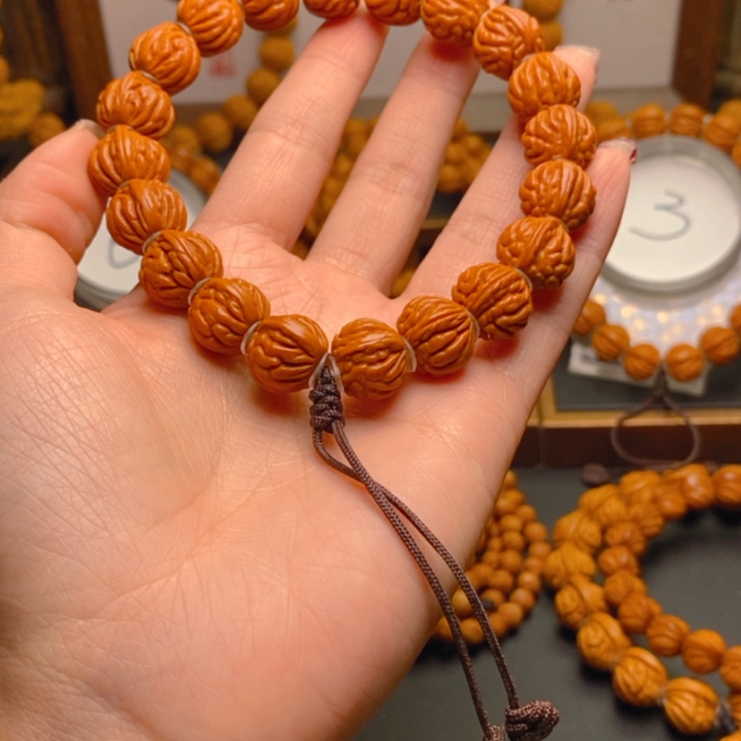 【闪购商品】桃核手串?****鱼龙文桃核