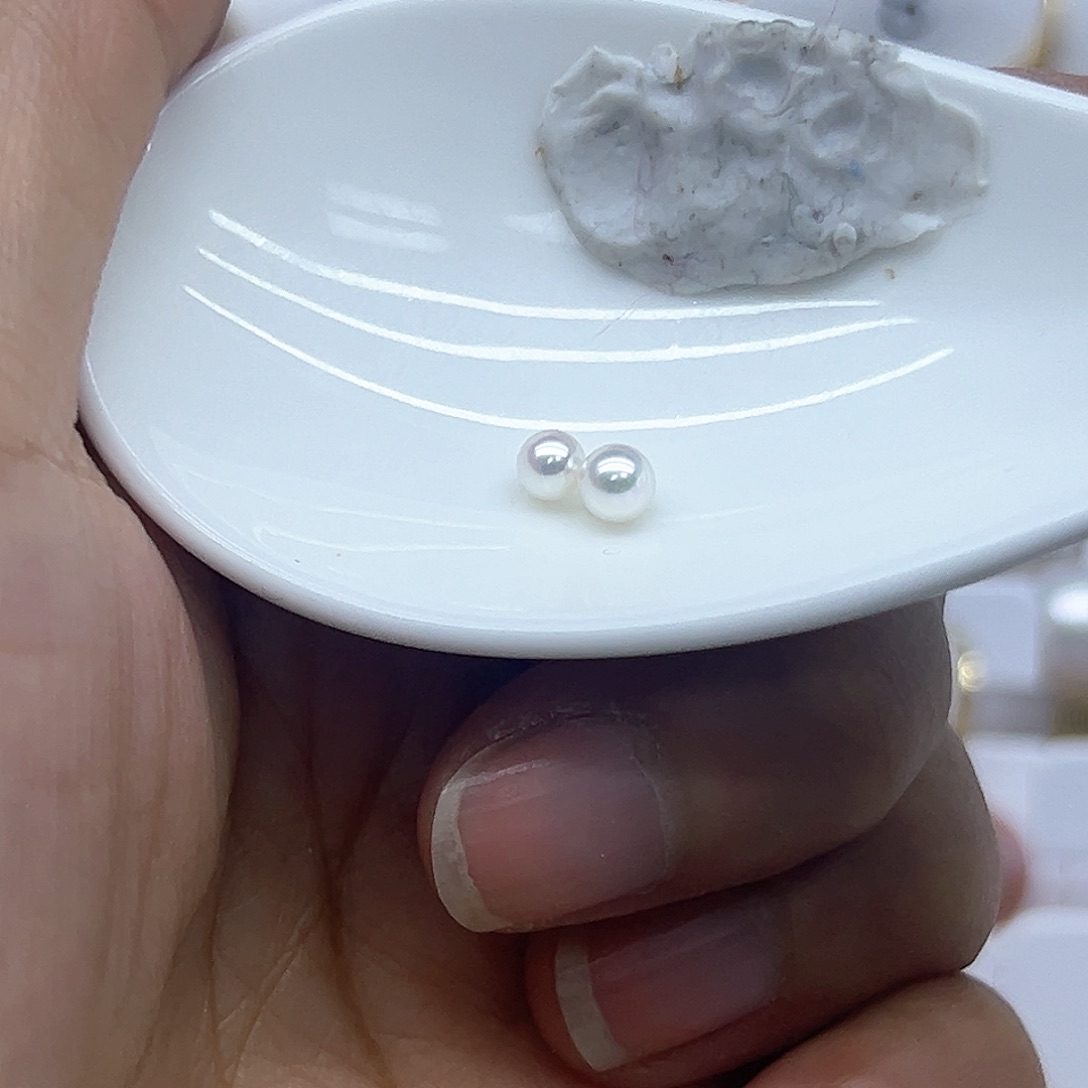 淡水珍珠耳饰银S925镶嵌荔**?