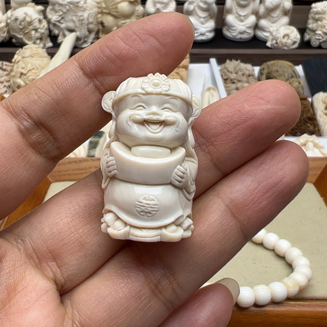 白玉菩提吊坠精****床猛犸