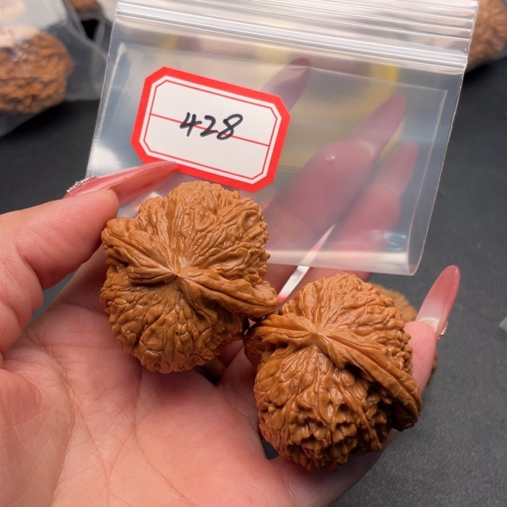 松***白把件文玩核桃白狮子