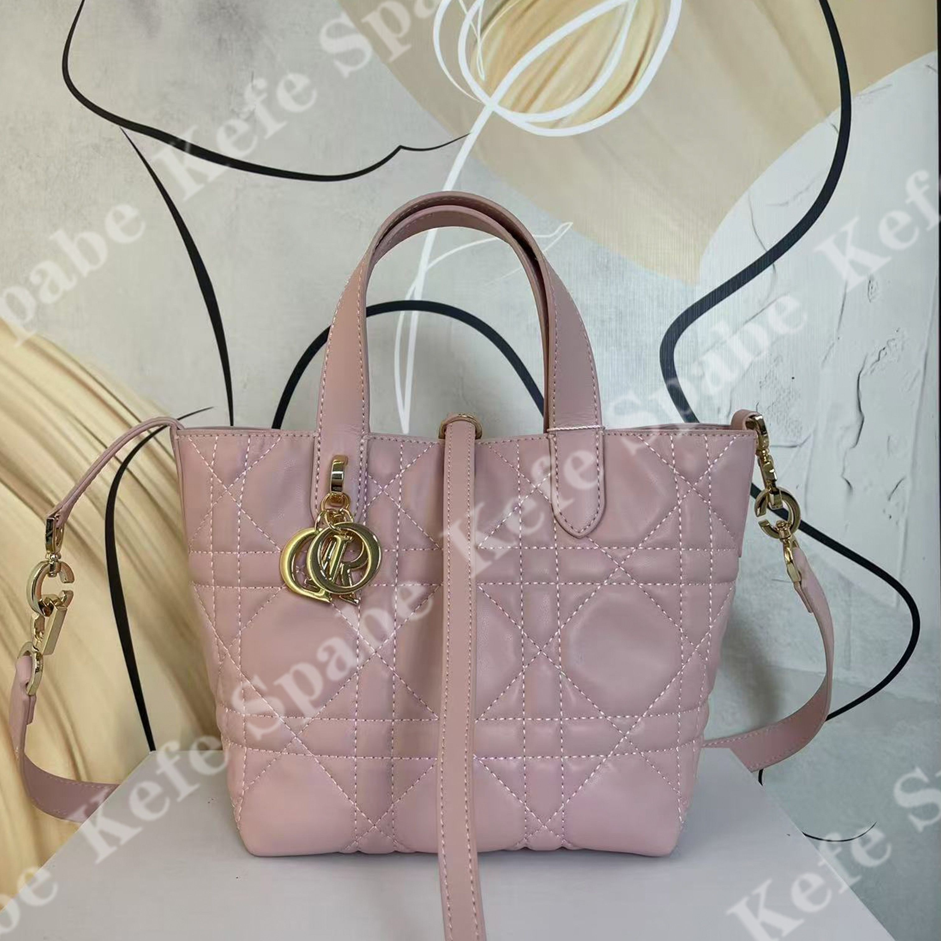 HM062  P25新款粉色竖版土著手提包-1