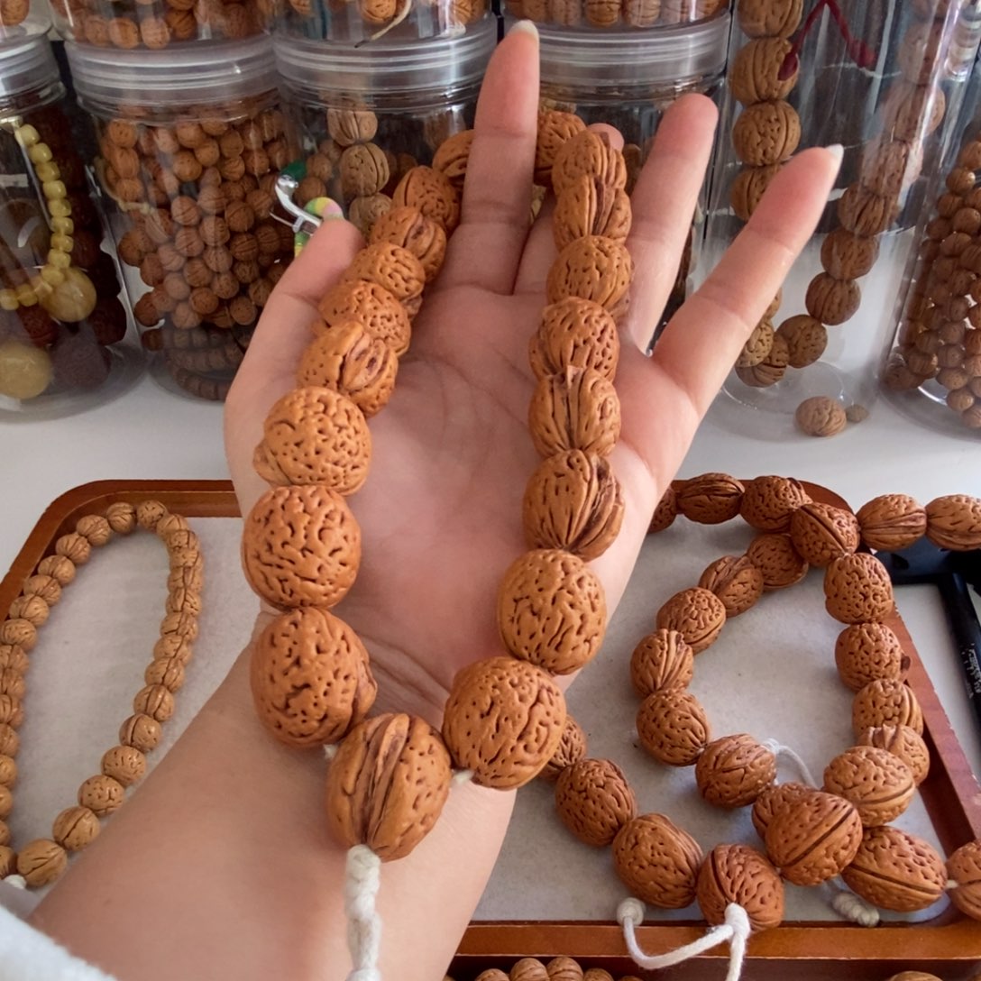 硫***克桃核吊坠盘锦野生红皮生命