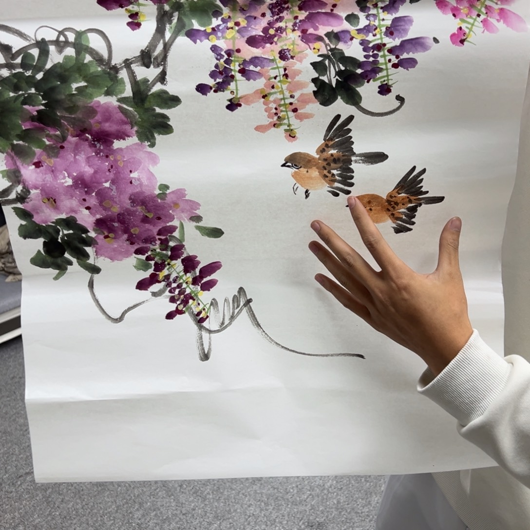 国画卖字画的小男孩